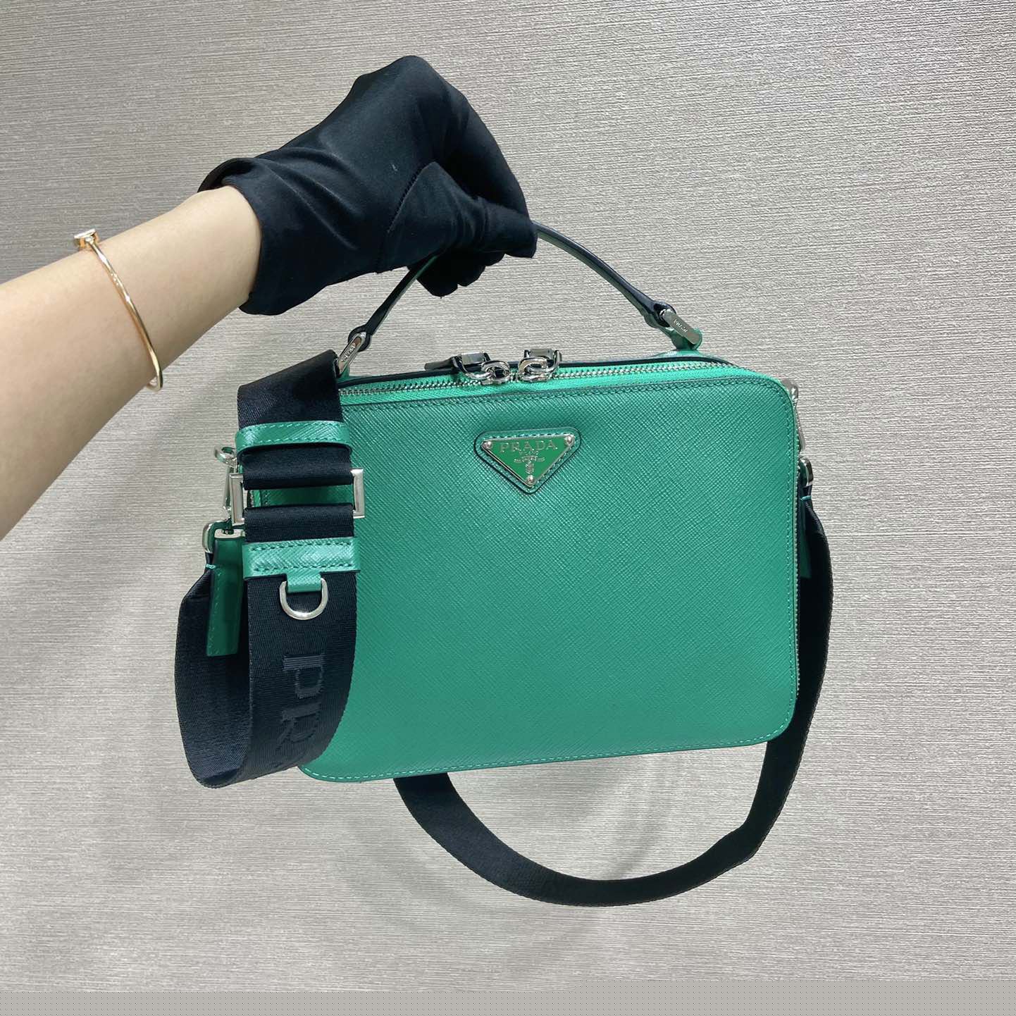 Pra*a top handle bags
